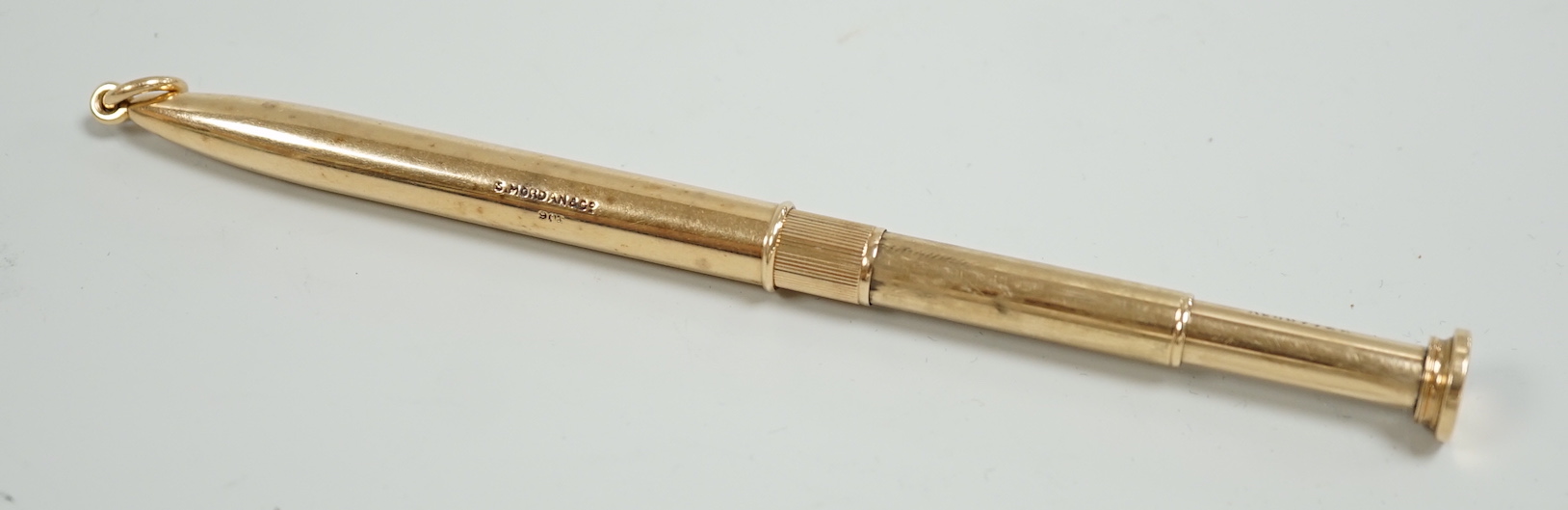 A 9ct mounted propelling pencil by S. Mordan & Co, closed 8cm.